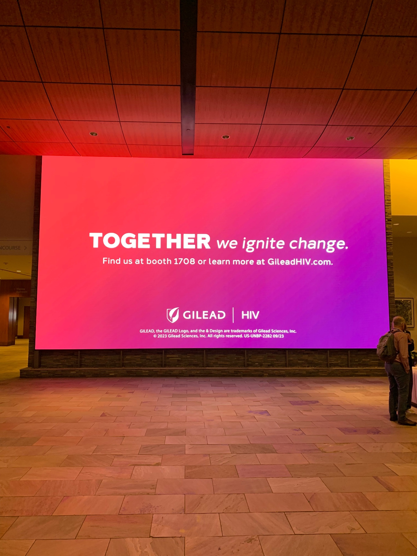 Gilead HIV lobby OOH installation — Together we ignite change.